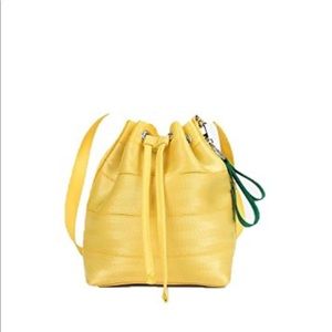 ISO - Harvey's Seatbelt mini bucket bag in lemon